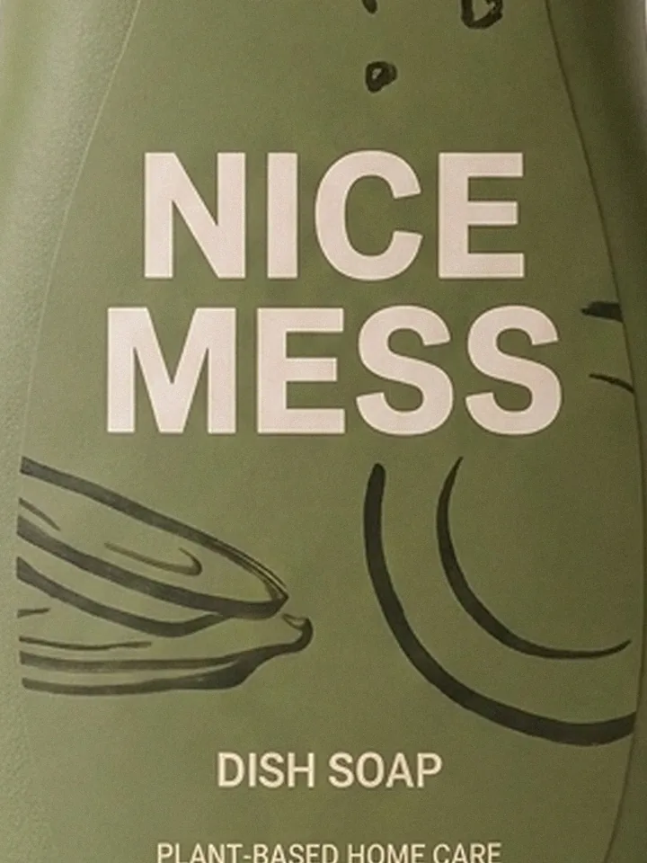 Close-up of the crumbs and plates illustration on the Dish Soap label
