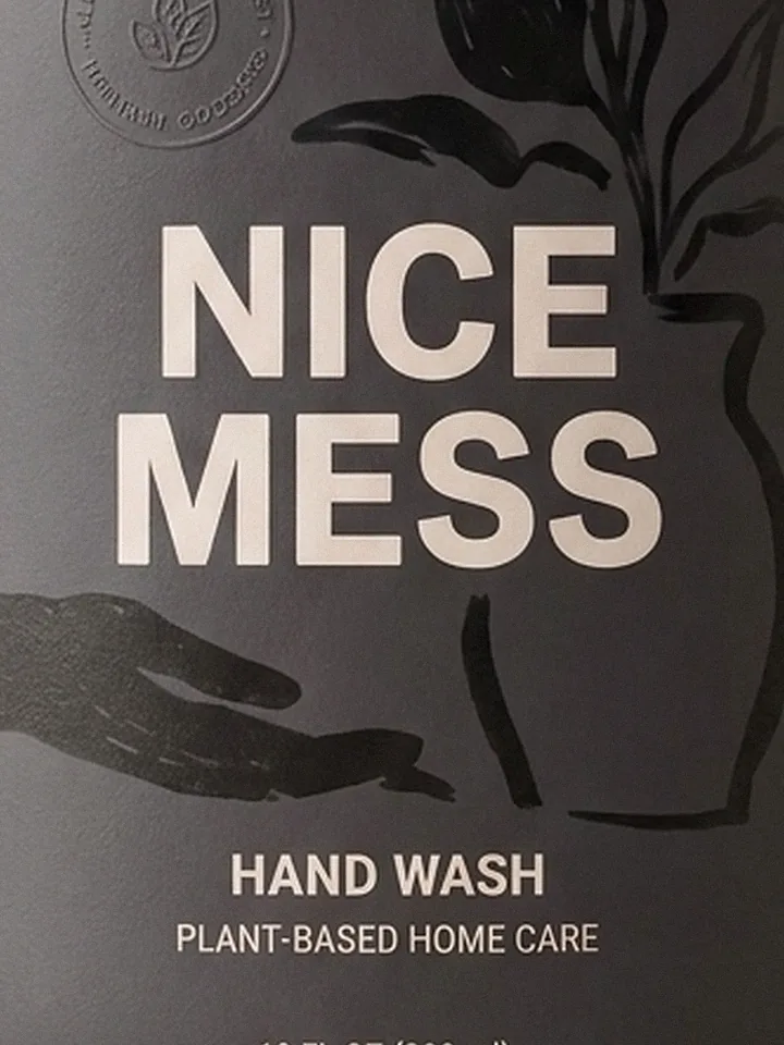 Close-up of the plant and hand illustration on the Hand Wash label