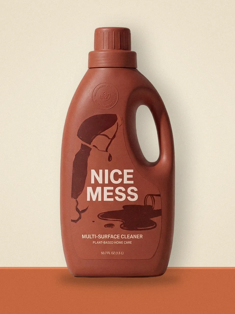 Terracotta Nice Mess Multi-Surface Cleaner 1.5 L bottle on a colour-block shelf